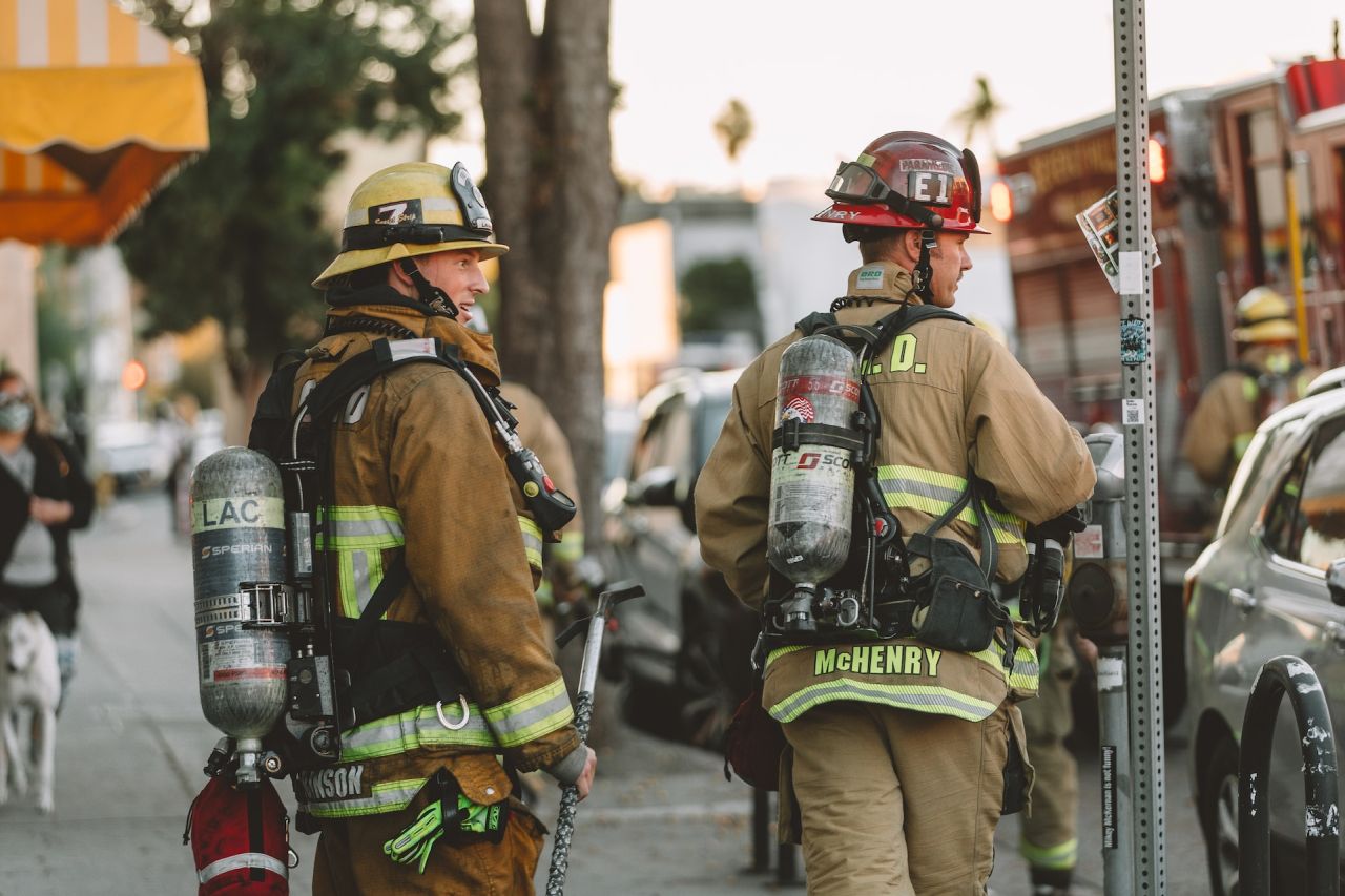 Firefighters on the street responding to emergency.