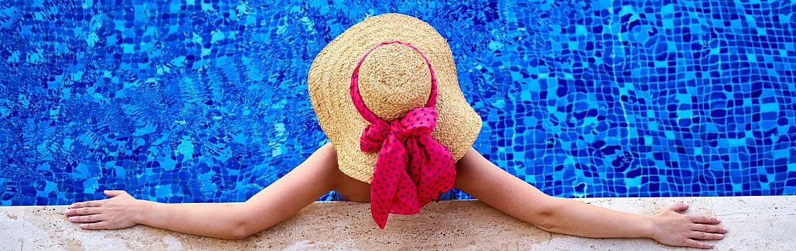 Woman Enjoying a Swimming Pool in Florida